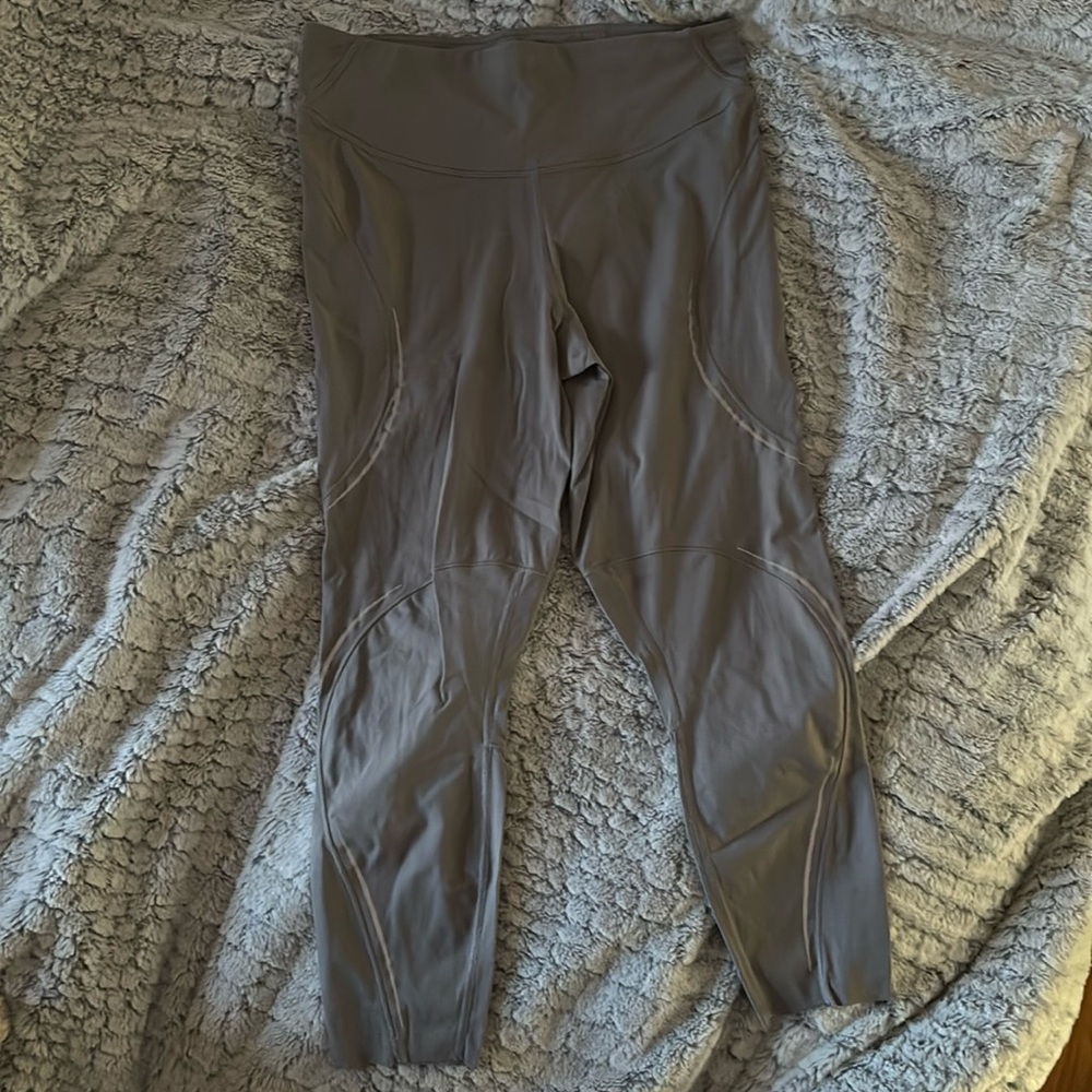 High-rise running pants with reflective detailing